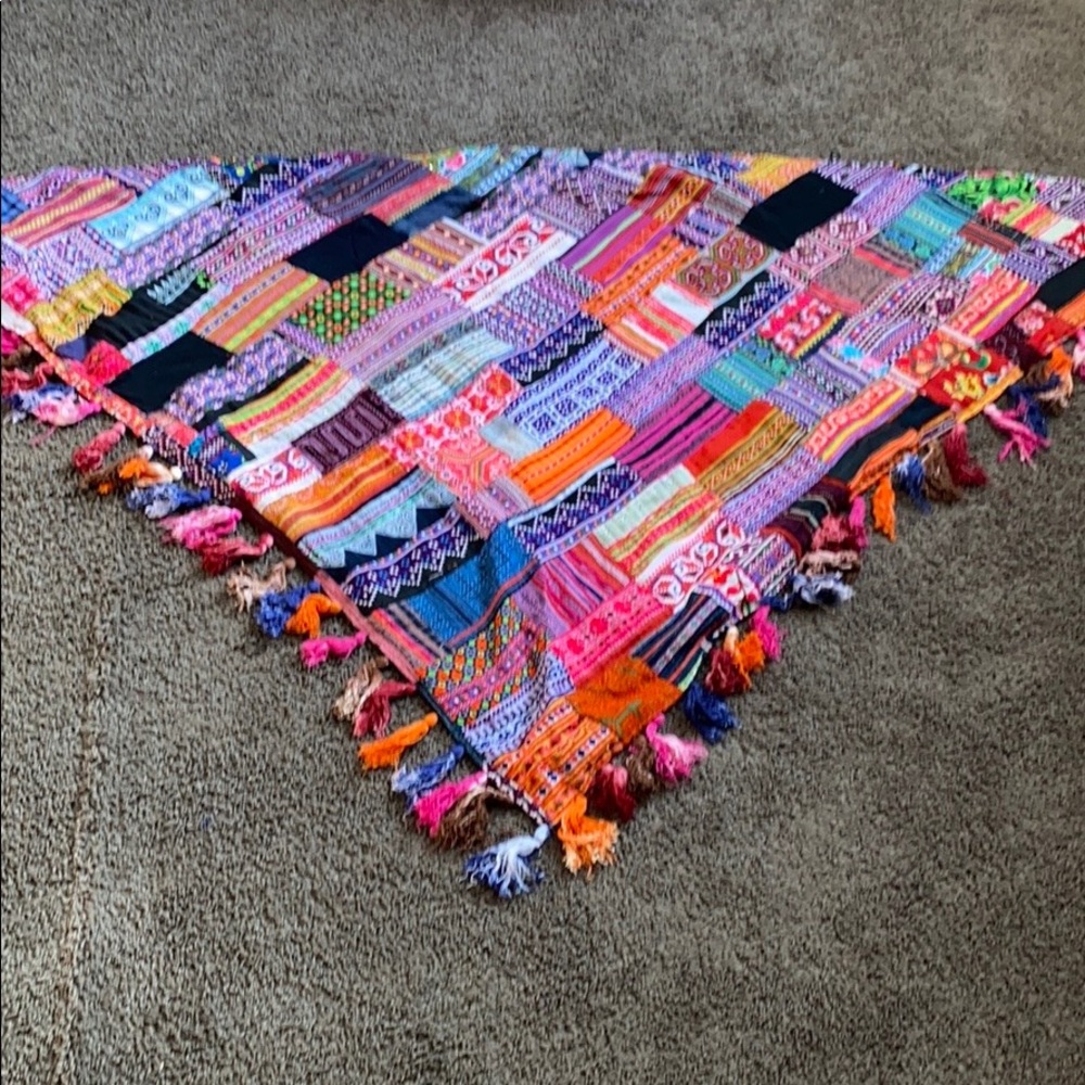 Shawls are handmade work from northern Thailand. ￼
